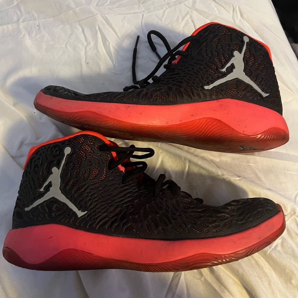 Jordan Ultra Fly
Black Infrared 23 Black and Red High-Top Sneakers